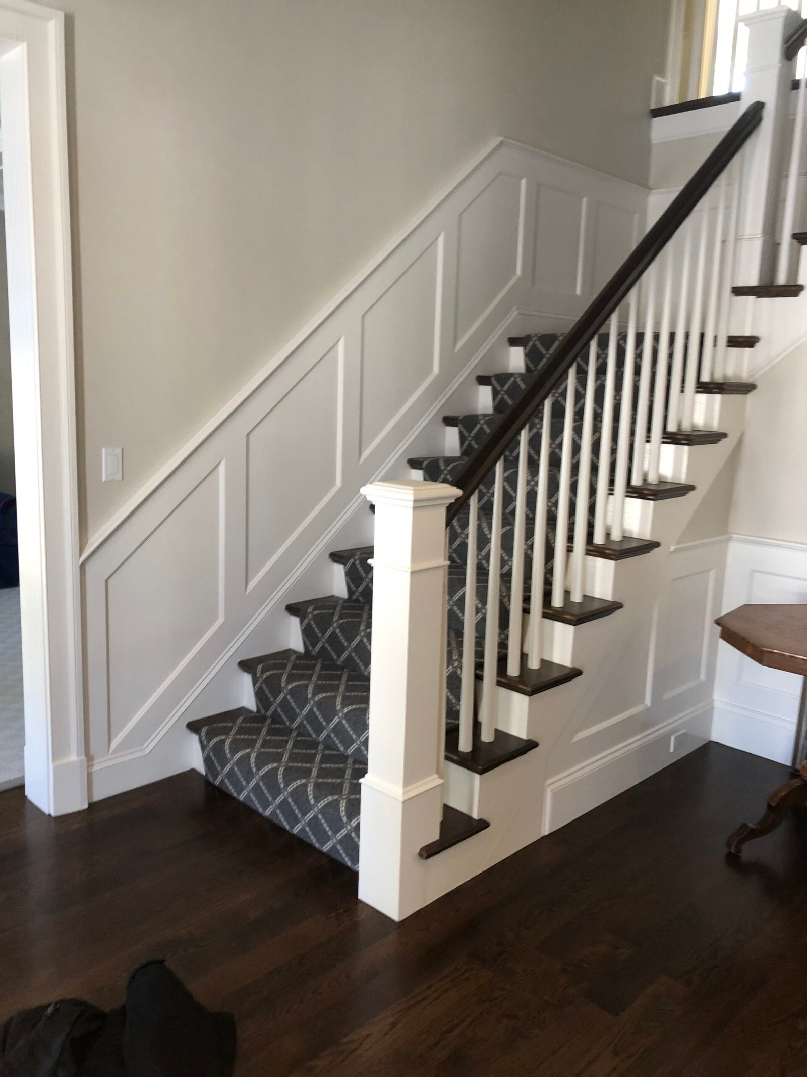 Custom staircase with wainscoting panels
