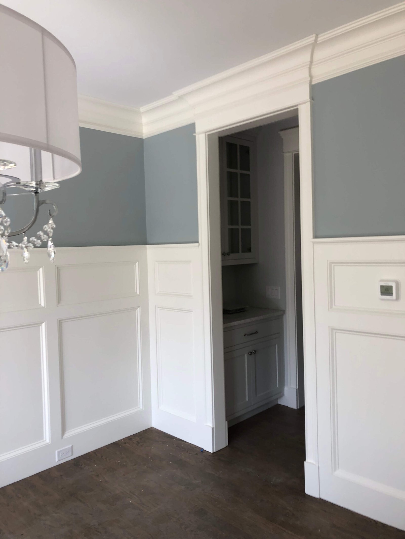 Dining room wainscoting with butler's pantry millwork